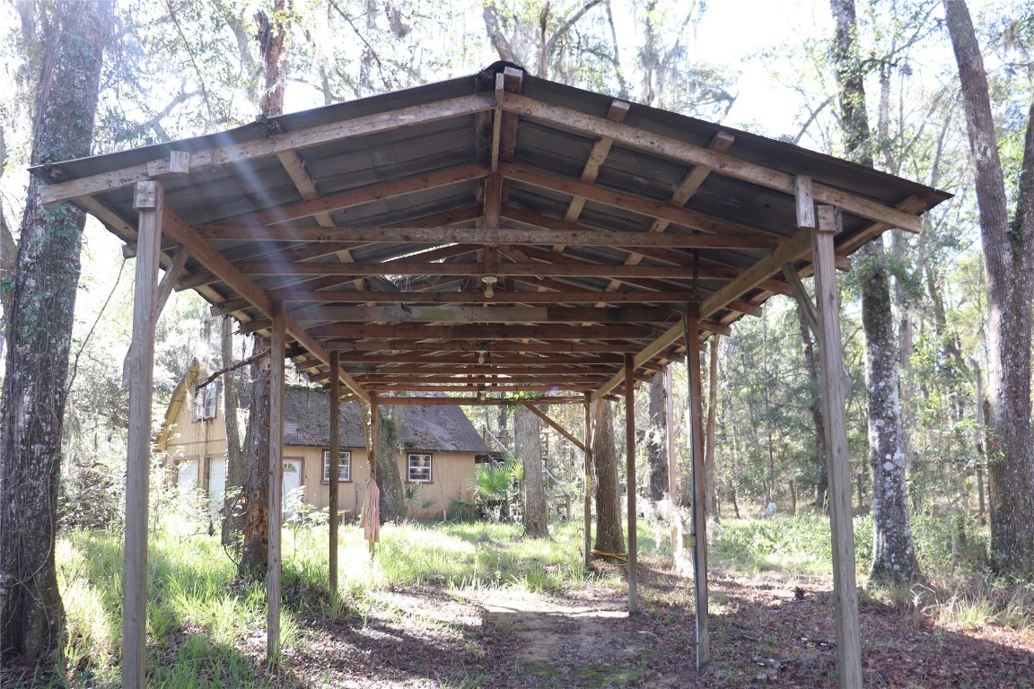 574154 Lessie Road Hilliard, FL 32046 - Photo 17 of 34 a view of a house with a large window
