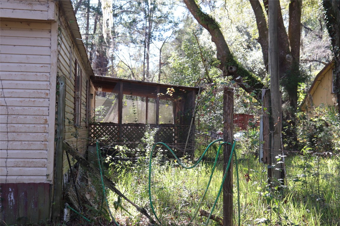 574154 Lessie Road Hilliard, FL 32046 - Photo 10 of 34 a view of swimming pool from a balcony