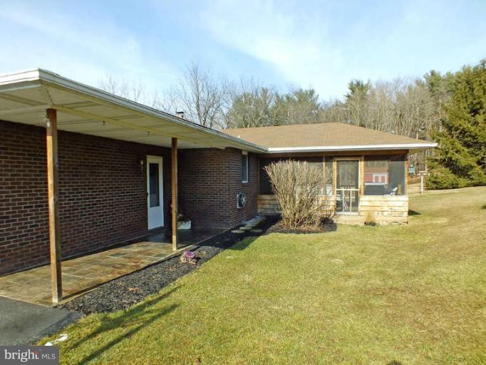 2914 Hoffman Mill Road Hampstead, MD 21074 - Photo 22 of 26 There is a covered back porch.