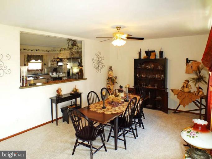 2914 Hoffman Mill Road Hampstead, MD 21074 - Photo 4 of 26 Living Room has a bay window & cut-out to kitchen