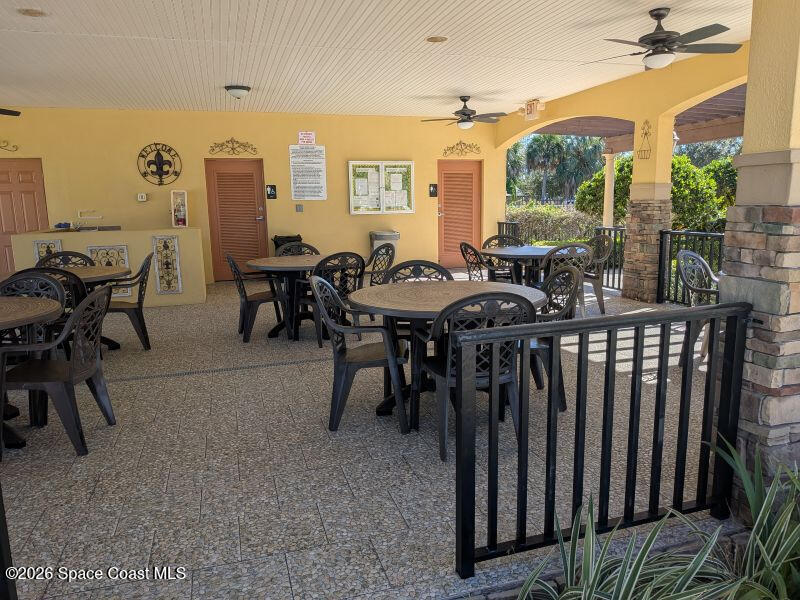 4530 Radiant Way, Unit 101 Melbourne, FL 32901 - Photo 16 of 26 a view of a dining room with furniture window and outside view