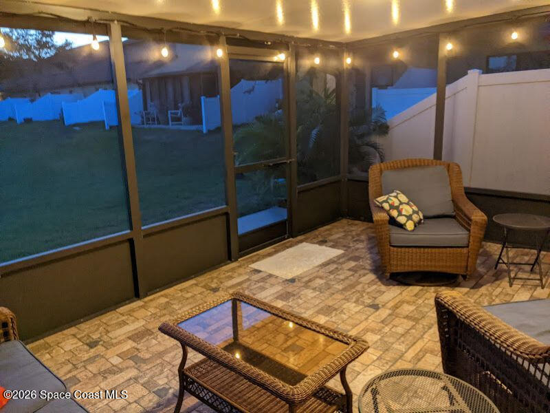 4530 Radiant Way, Unit 101 Melbourne, FL 32901 - Photo 8 of 26 a living room with a couch