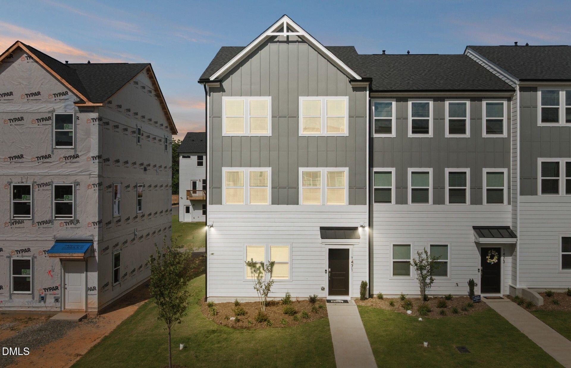 2544 Olive Chapel Road Apex, NC 27502 - Photo 22 of 32 a view of multiple houses with a yard
