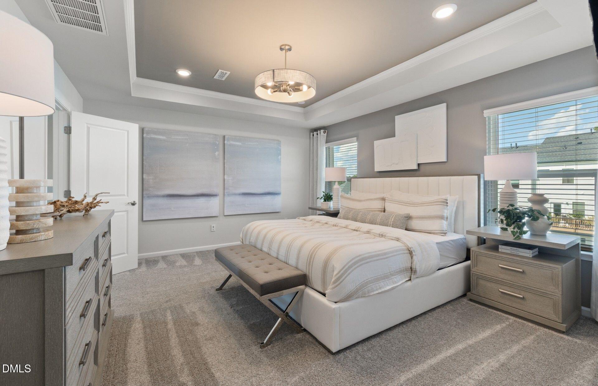 2544 Olive Chapel Road Apex, NC 27502 - Photo 9 of 32 a bedroom with a bed and a large window