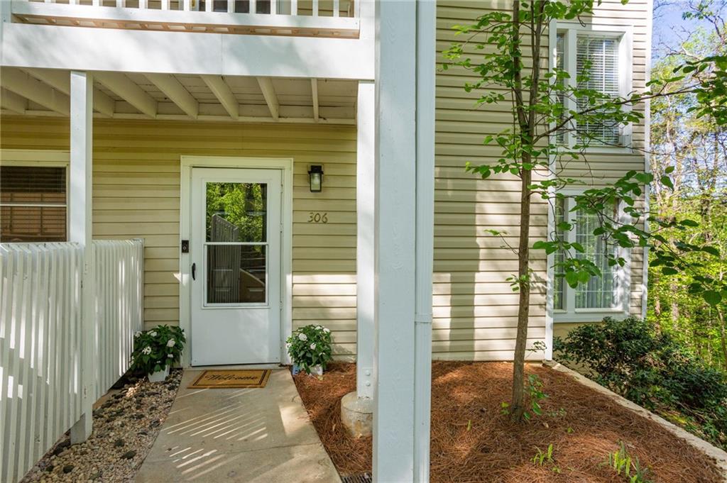 a view of porch with a potted plant