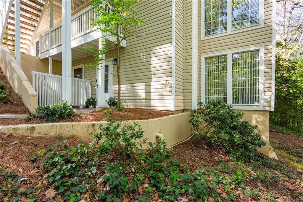 306 Countryside Place Smyrna, GA 30080 - Photo 32 of 35 a view of a house with a yard and plants