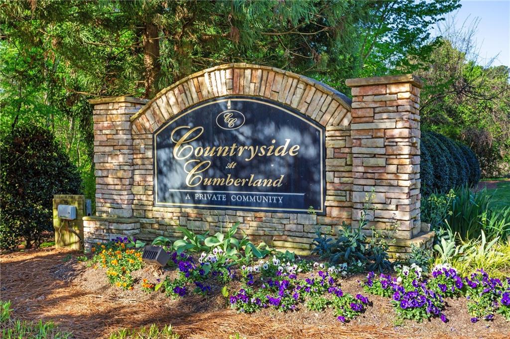 306 Countryside Place Smyrna, GA 30080 - Photo 33 of 35 a sign that is sitting in front of flowers