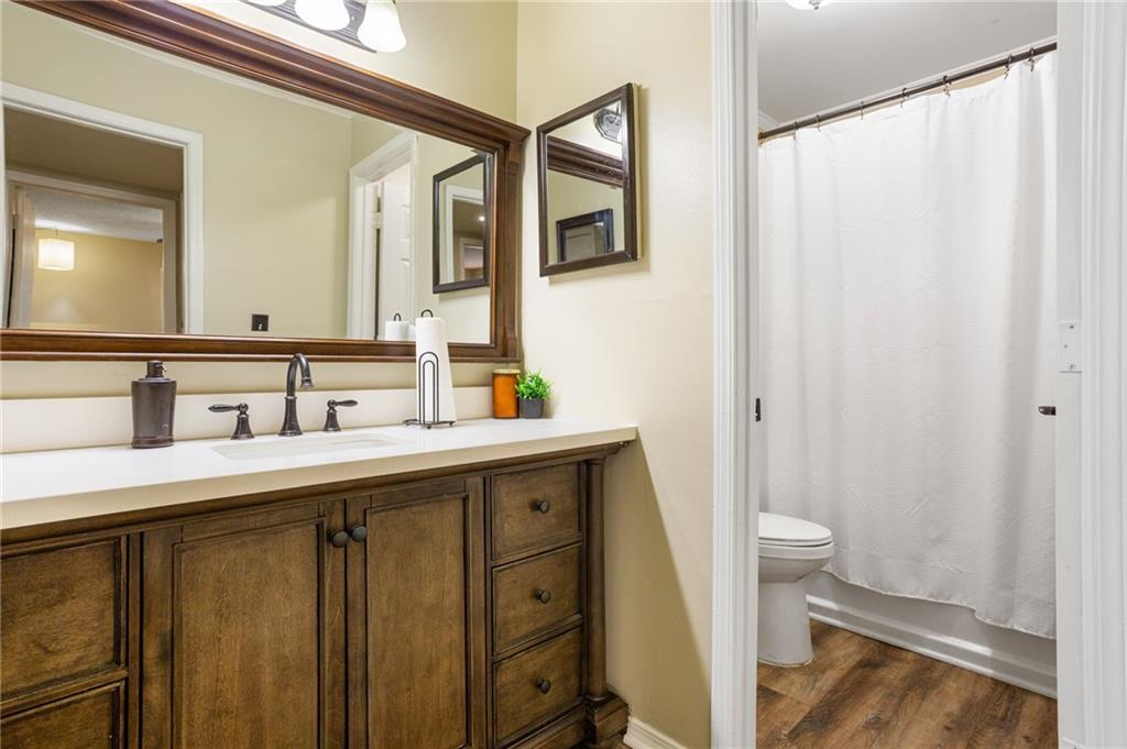 306 Countryside Place Smyrna, GA 30080 - Photo 6 of 35 a bathroom with a sink and a mirror