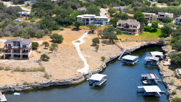 an aerial view of a house with a ocean view