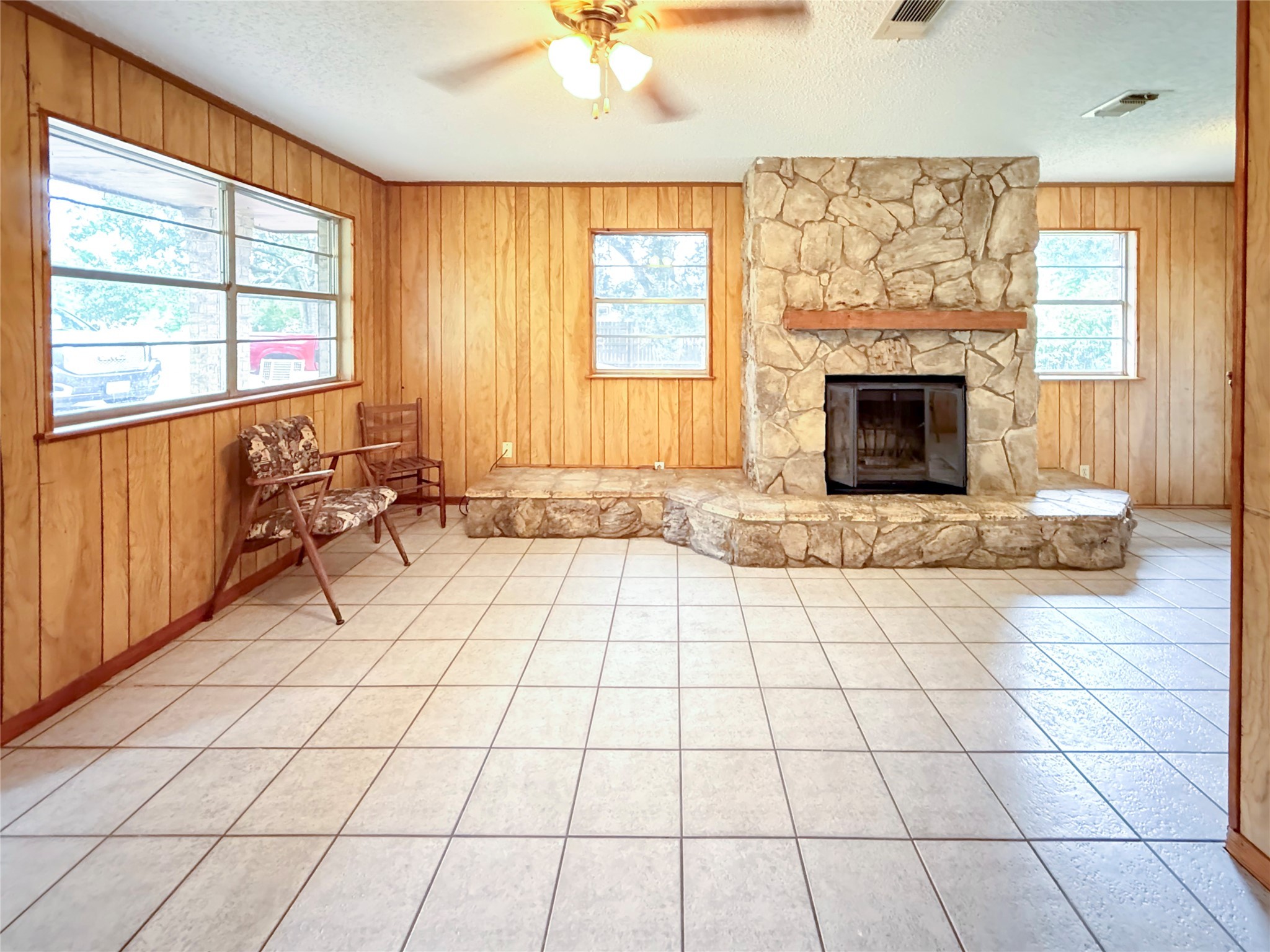 122 County Road 725 Sweeny, TX 77480 - Photo 2 of 13 a view of empty room with fireplace and windows