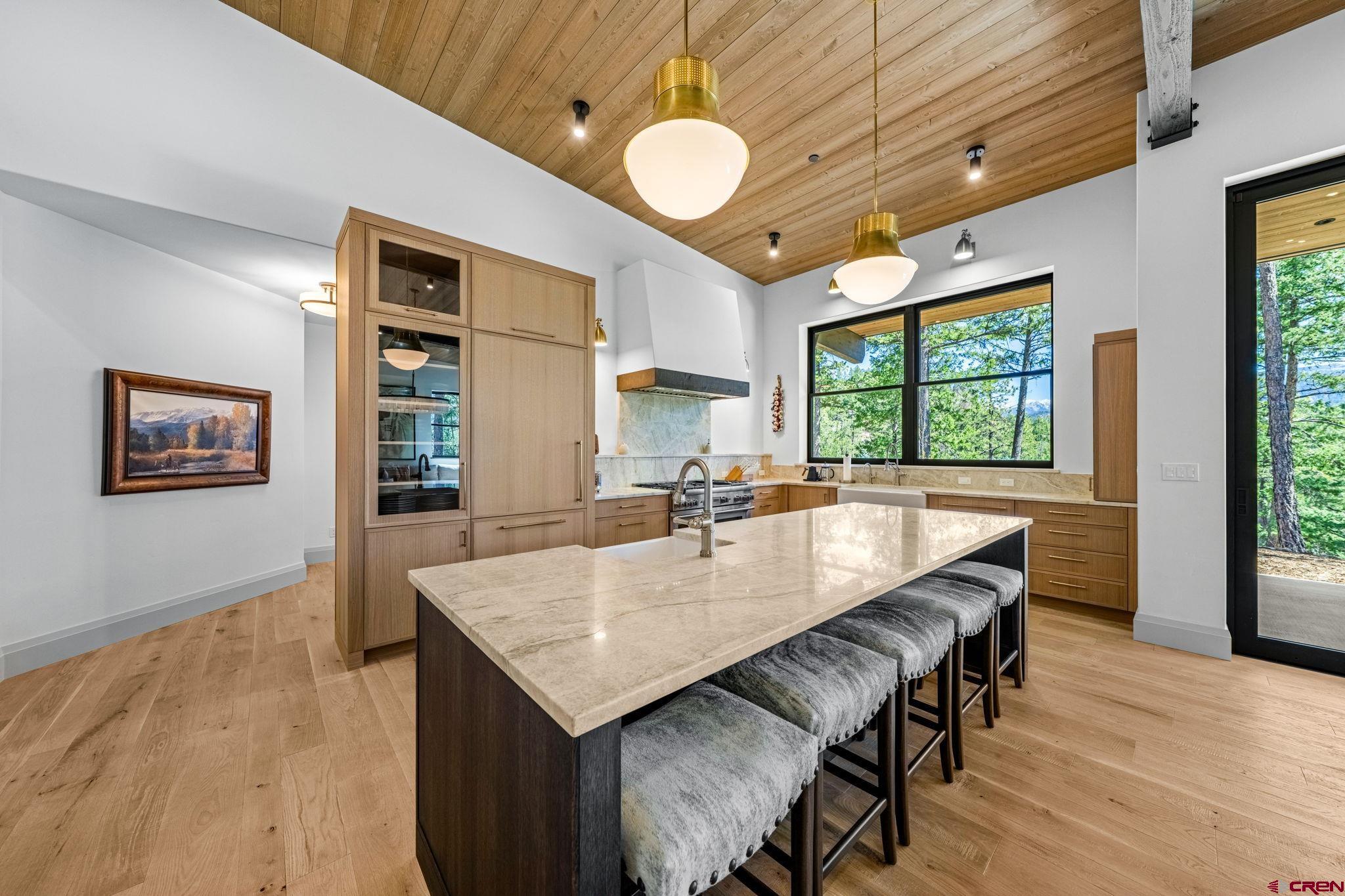 49 Bluff Drive Durango, CO 81301 - Photo 19 of 45 a view of a dining room with furniture and wooden floor