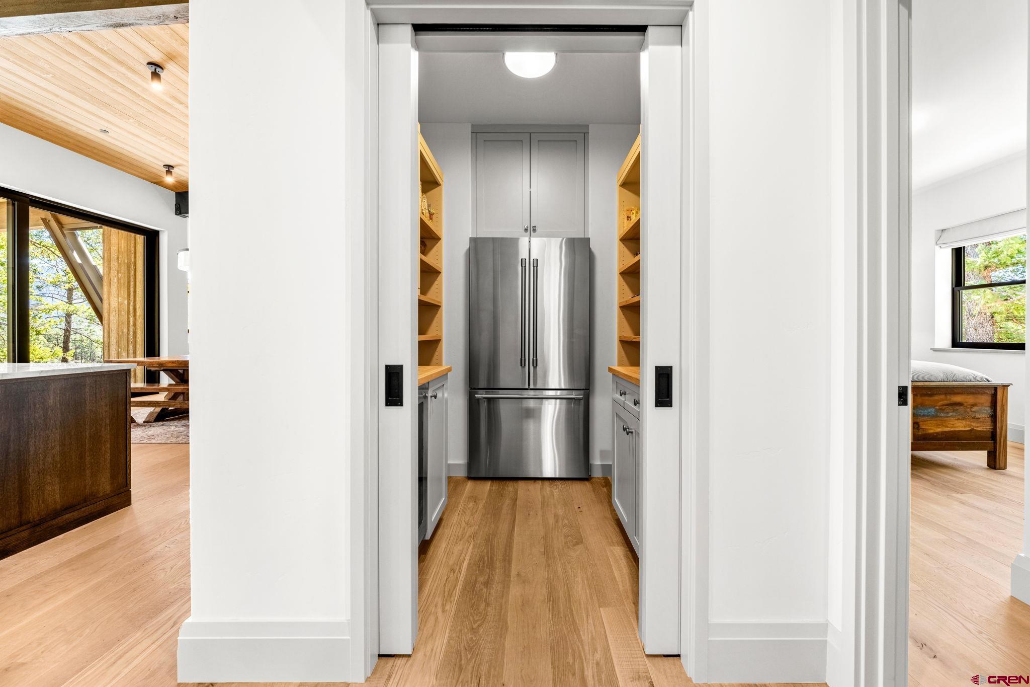 49 Bluff Drive Durango, CO 81301 - Photo 22 of 45 a view of a kitchen from the hallway