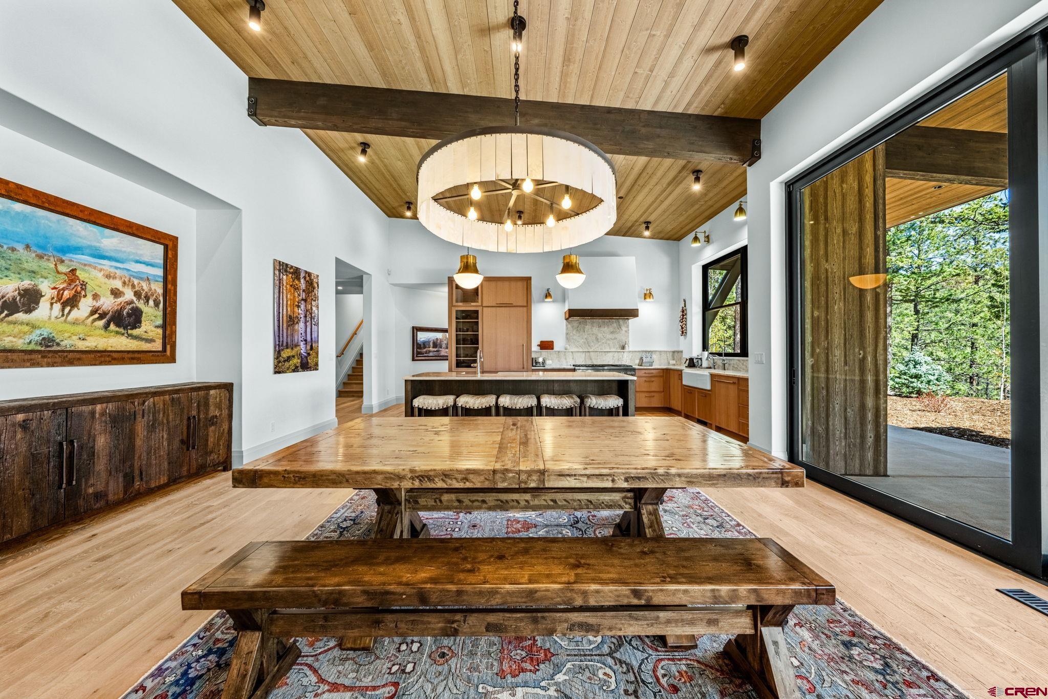 49 Bluff Drive Durango, CO 81301 - Photo 23 of 45 a kitchen with wooden floor and a view of living room