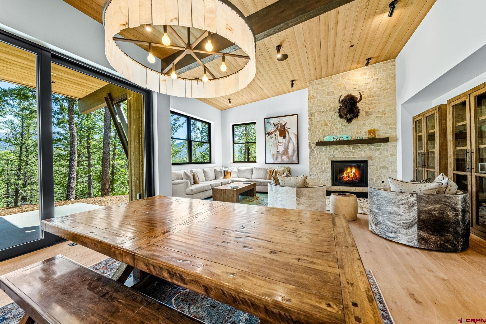 49 Bluff Drive Durango, CO 81301 - Photo 25 of 45 a living room with fireplace furniture and a fireplace
