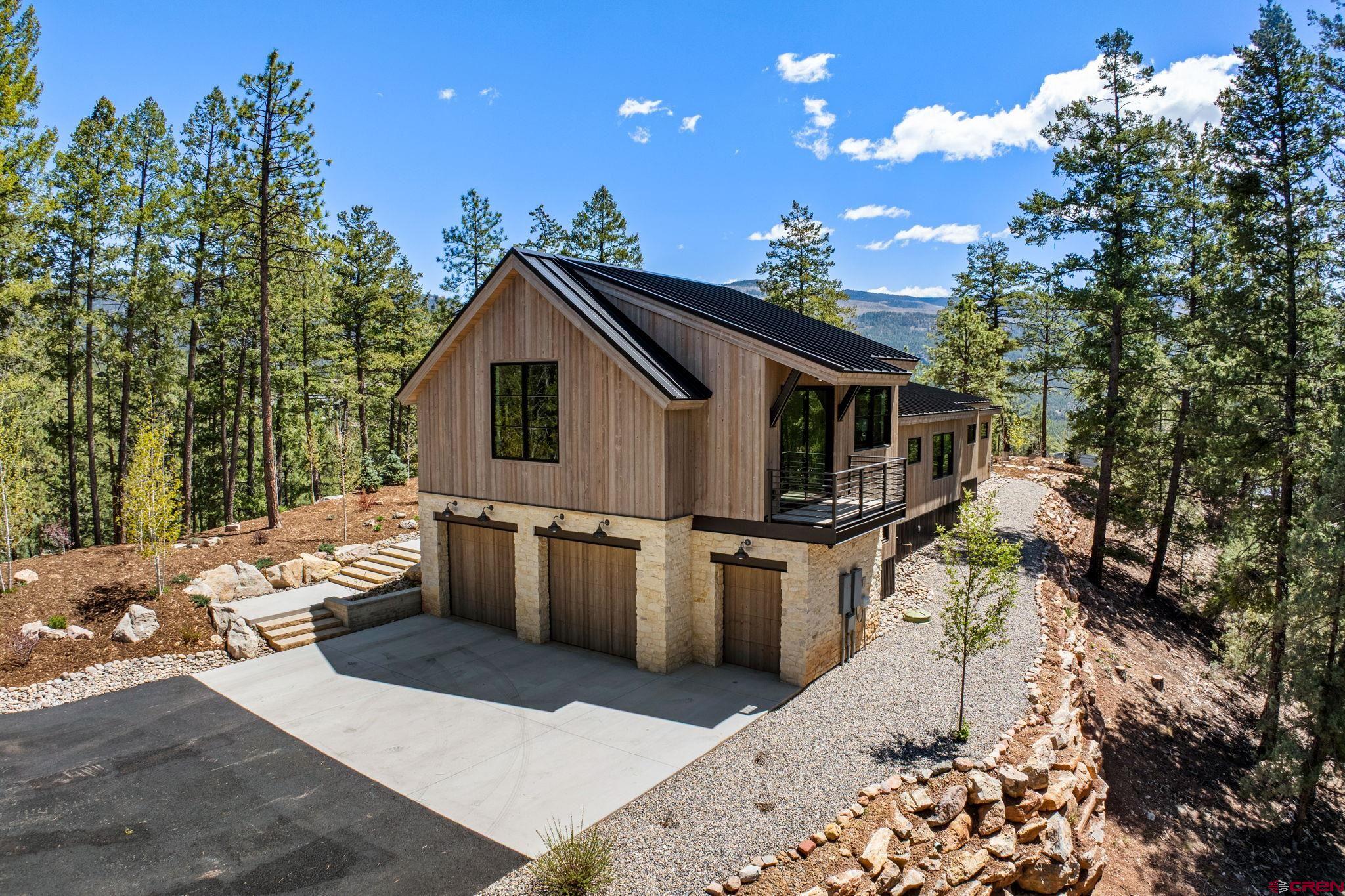 49 Bluff Drive Durango, CO 81301 - Photo 3 of 45 a view of a house with a patio