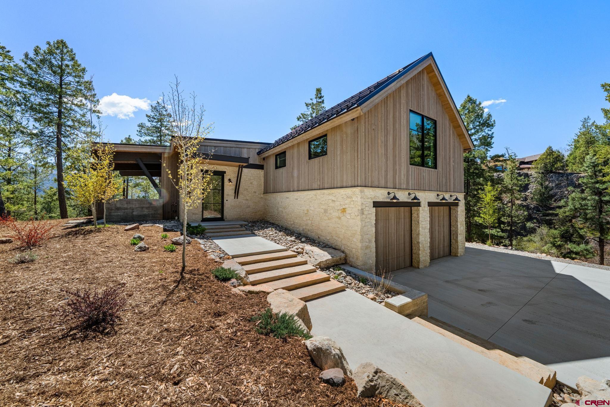 49 Bluff Drive Durango, CO 81301 - Photo 4 of 45 a front view of house with pathway