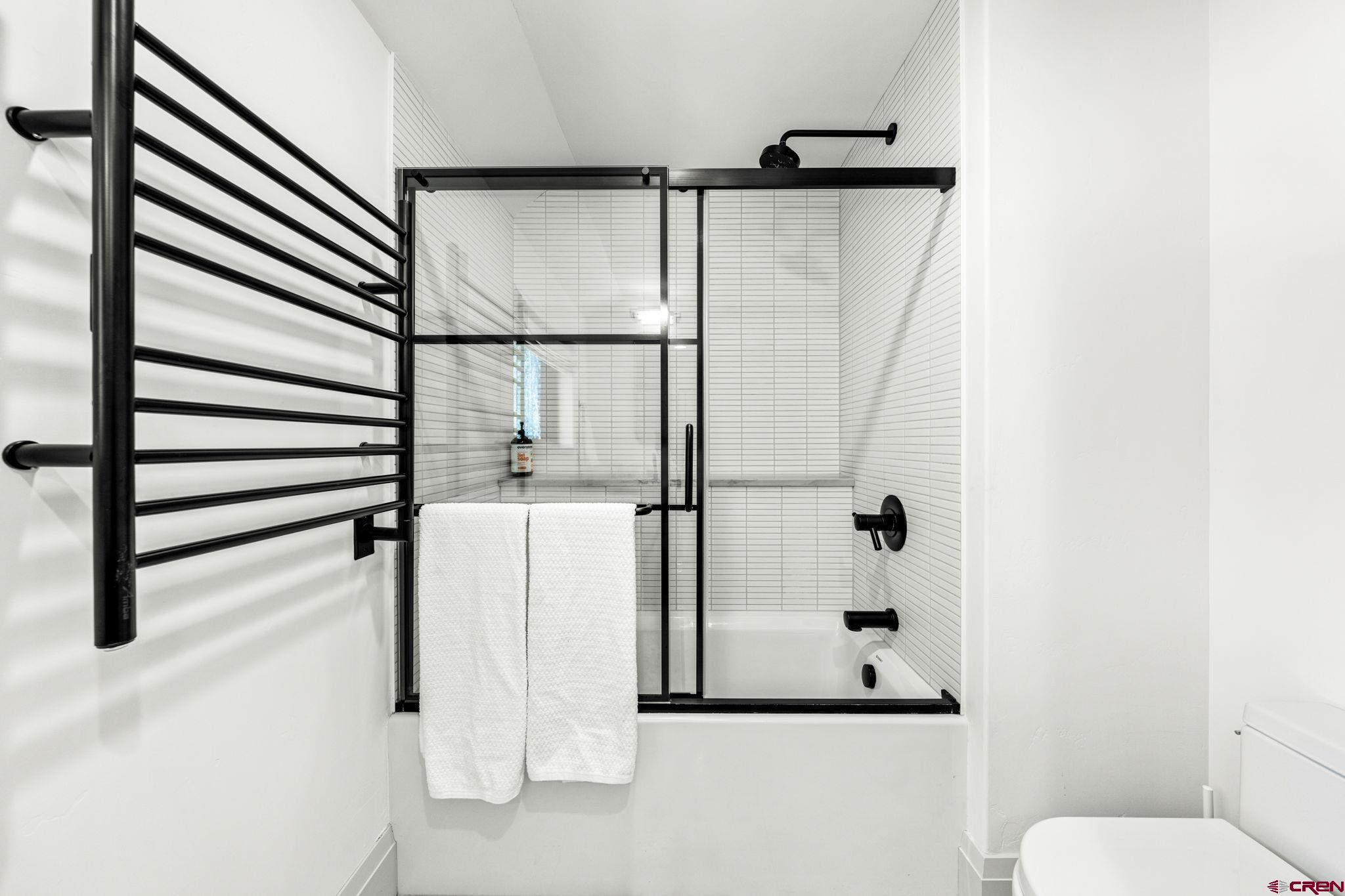 49 Bluff Drive Durango, CO 81301 - Photo 41 of 45 a bathroom with a shower and a toilet
