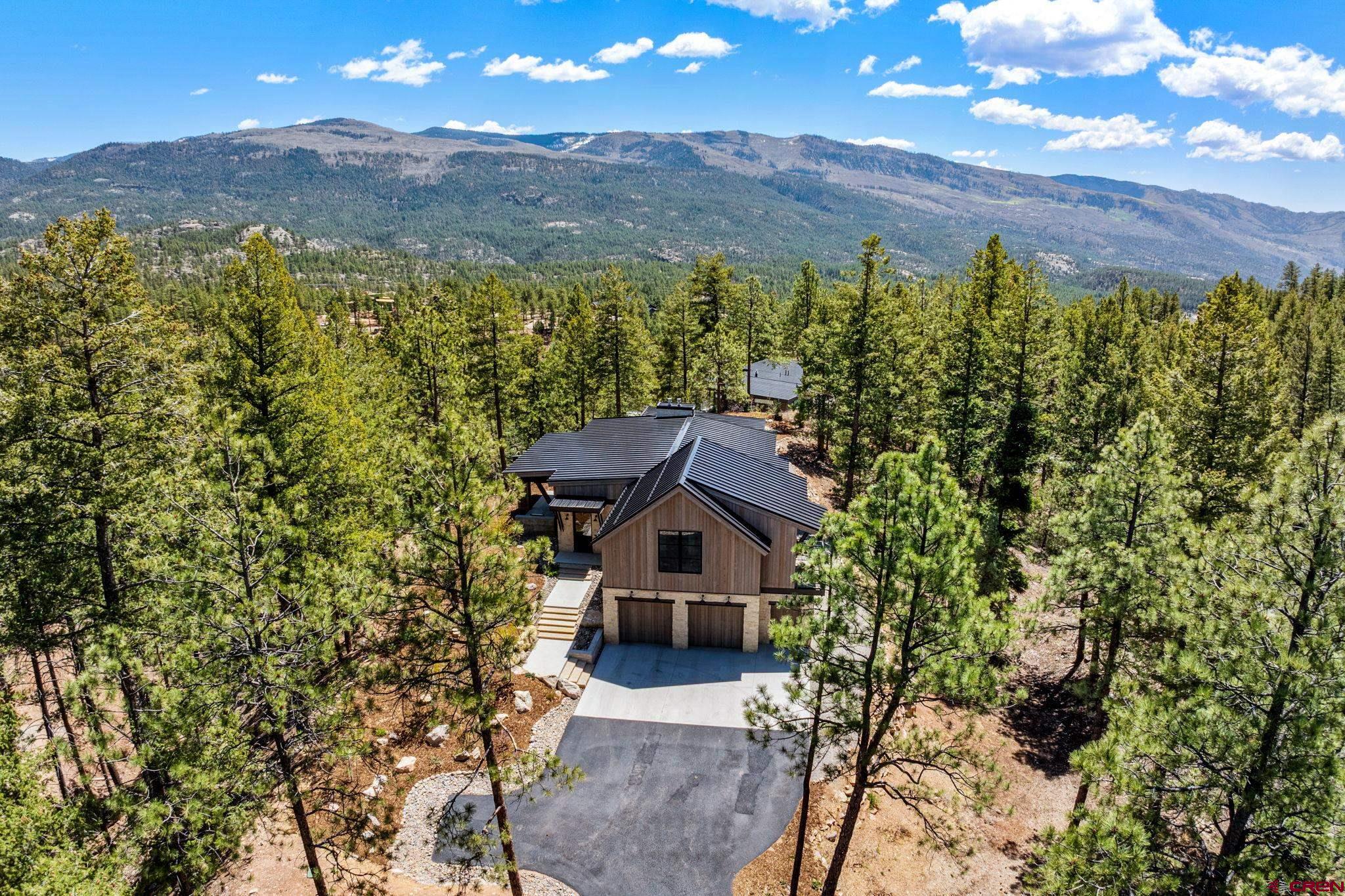 49 Bluff Drive Durango, CO 81301 - Photo 7 of 45 a view of a house with a yard