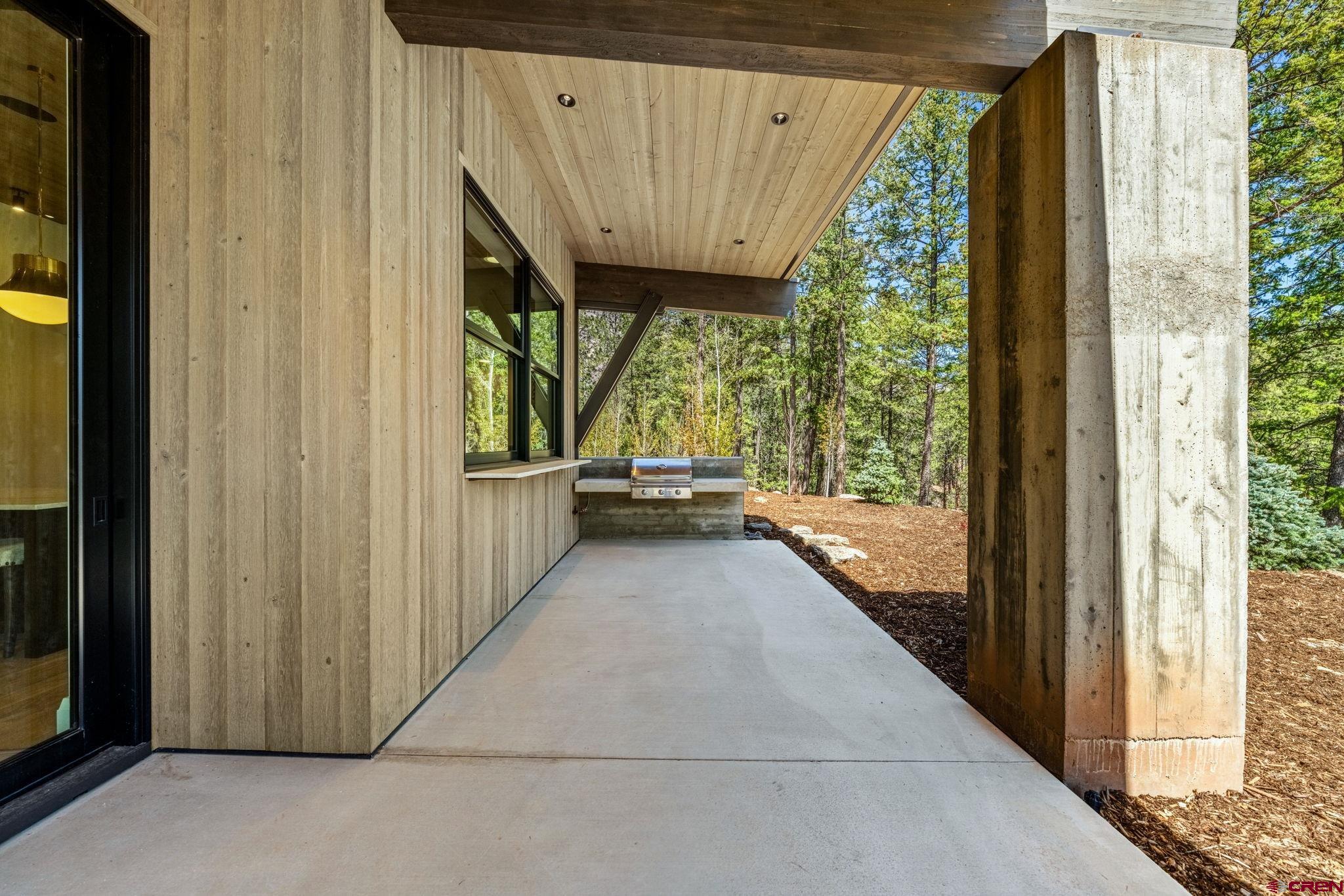 49 Bluff Drive Durango, CO 81301 - Photo 10 of 45 a view of a balcony with wooden floor and outdoor space