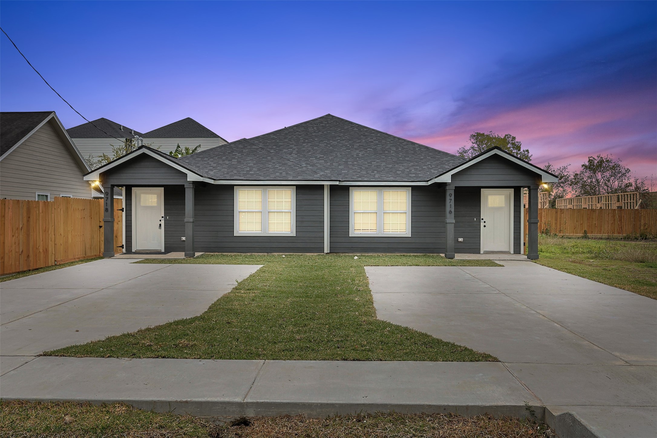a front view of a house with yard
