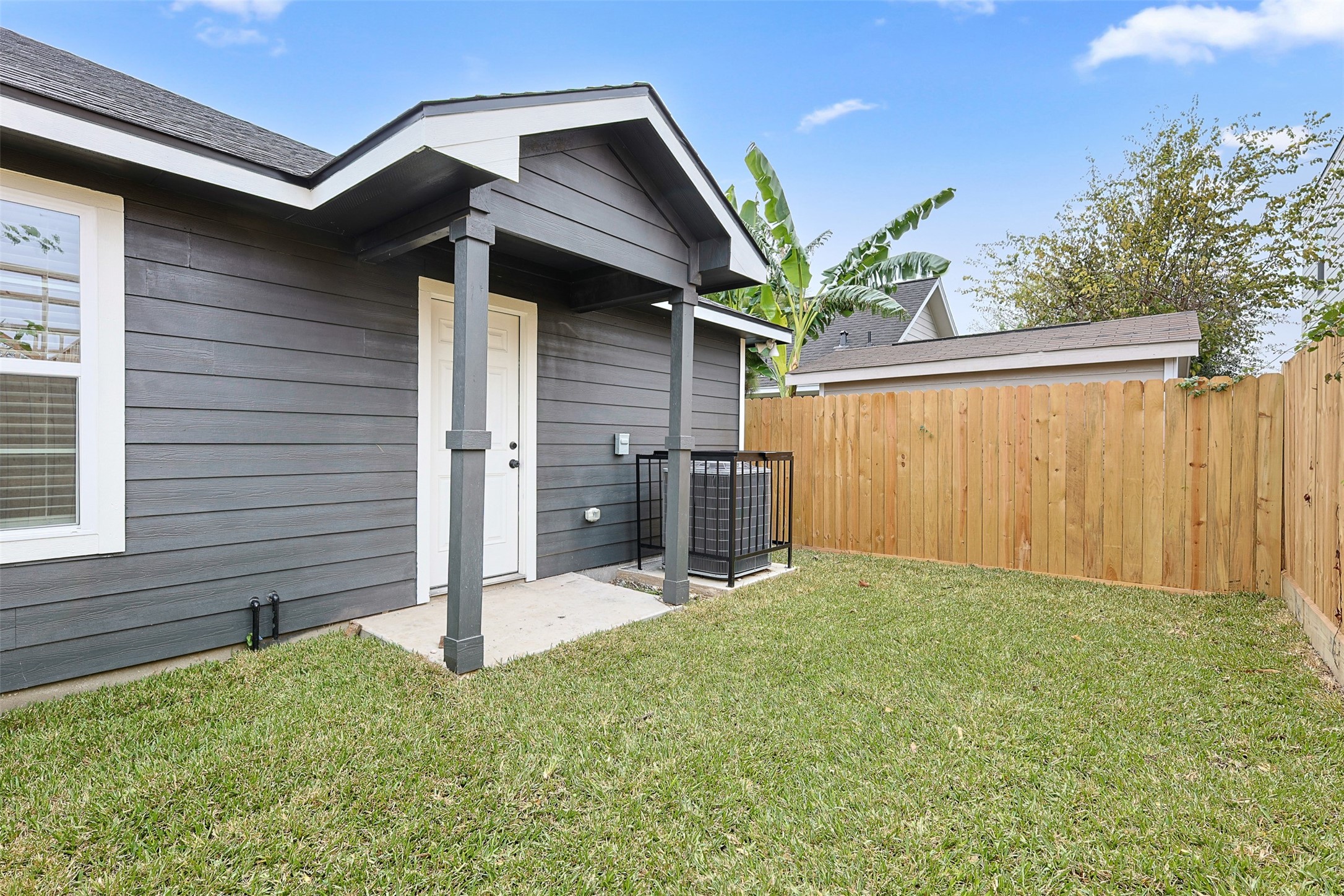 9718 Fillmore Street Houston, TX 77029 - Photo 25 of 30 a view of a house with a backyard