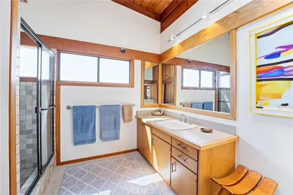 a utility room with sink dryer and washer
