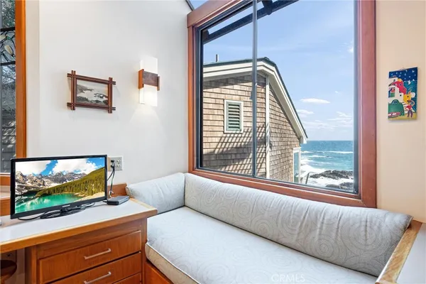 a living room with a couch and a flat screen tv