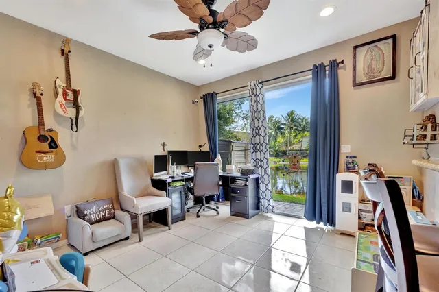 a view of a workspace with furniture