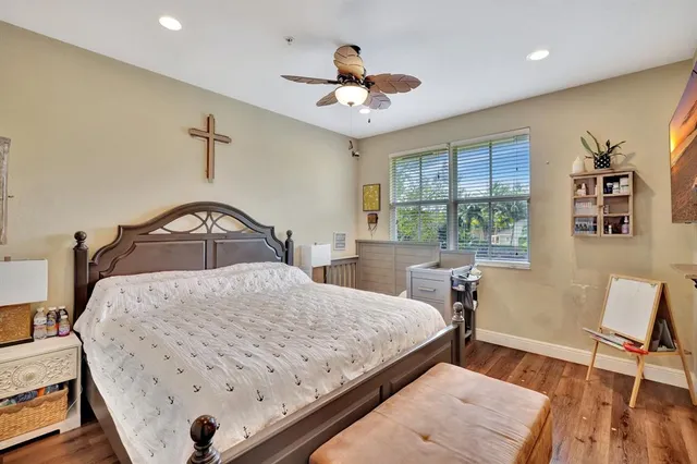 a bathroom with a toilet a sink and a mirror