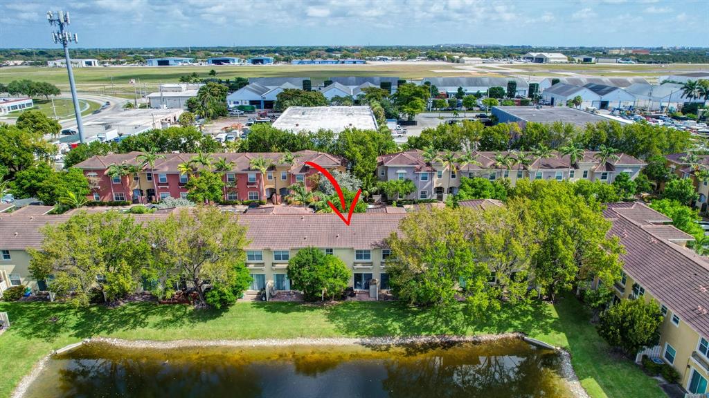 2851 Prospect Road, Unit 1209 Tamarac, FL 33309 - Photo 43 of 59 an aerial view of a houses with outdoor space and lake view