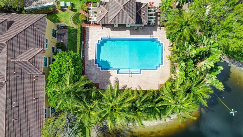 2851 Prospect Road, Unit 1209 Tamarac, FL 33309 - Photo 53 of 59 an aerial view of a house with a garden