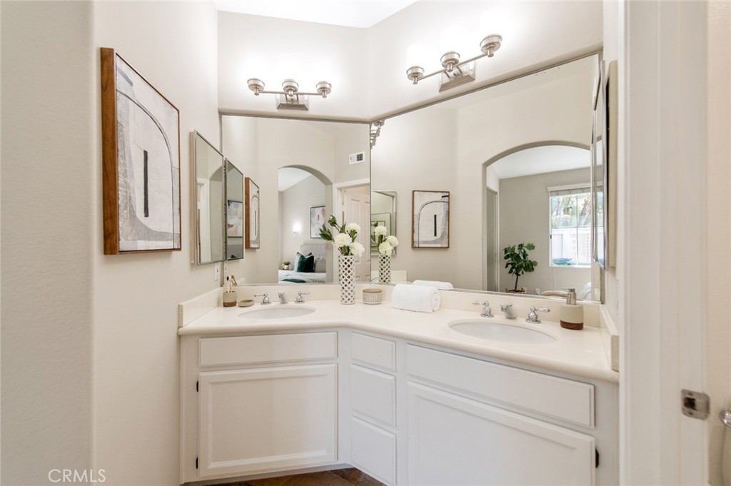 12 Parthenia Irvine, CA 92606 - Photo 14 of 25 a bathroom with a double vanity sink mirror and