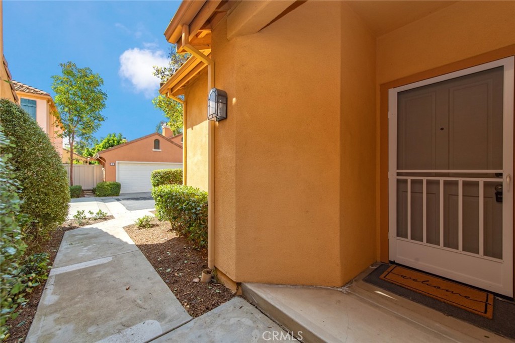12 Parthenia Irvine, CA 92606 - Photo 3 of 25 a view of a house with backyard and sitting area