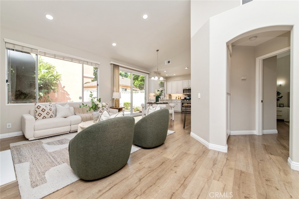12 Parthenia Irvine, CA 92606 - Photo 4 of 25 a living room with furniture and a large window