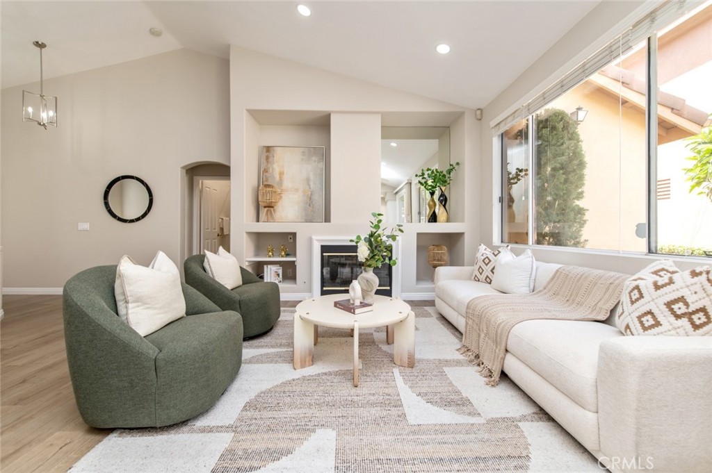12 Parthenia Irvine, CA 92606 - Photo 5 of 25 a living room with furniture and a large window