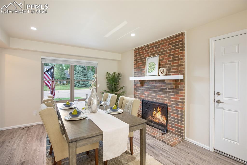 3004 Springlake Circle East Colorado Springs, CO 80906 - Photo 20 of 50 a dining room with furniture window and wooden floor