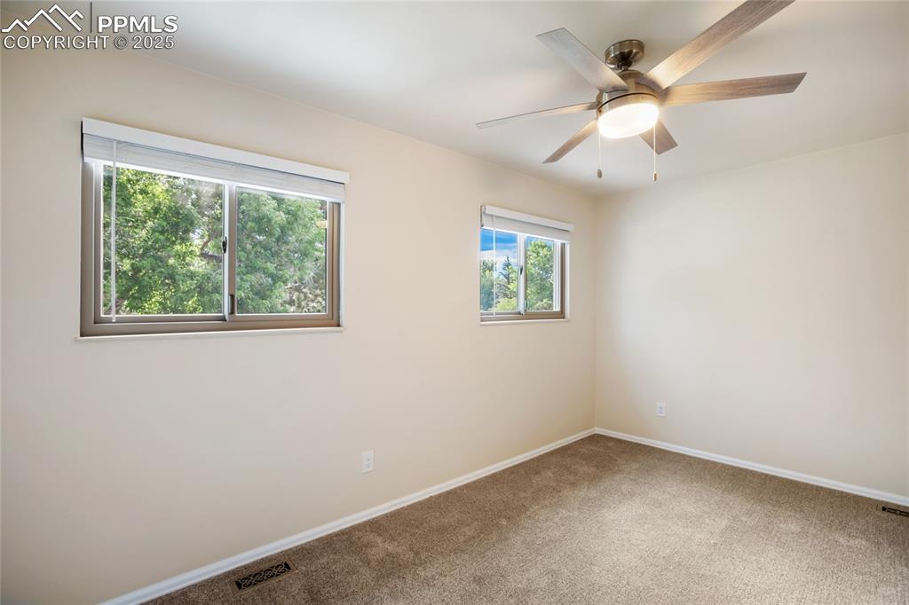 3004 Springlake Circle East Colorado Springs, CO 80906 - Photo 33 of 50 an empty room with a window