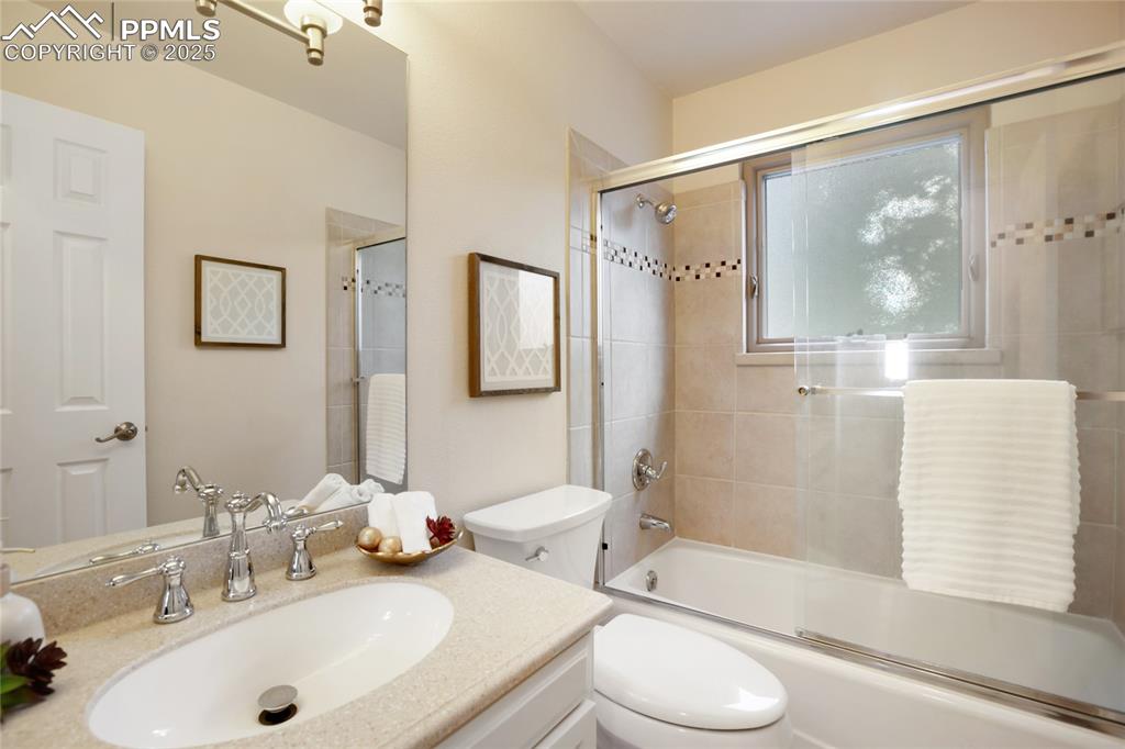 3004 Springlake Circle East Colorado Springs, CO 80906 - Photo 35 of 50 a bathroom with a sink toilet and shower