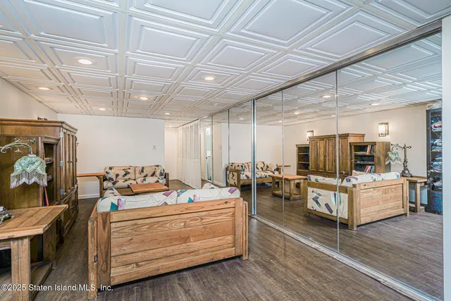 a view of outdoor space with wooden floor