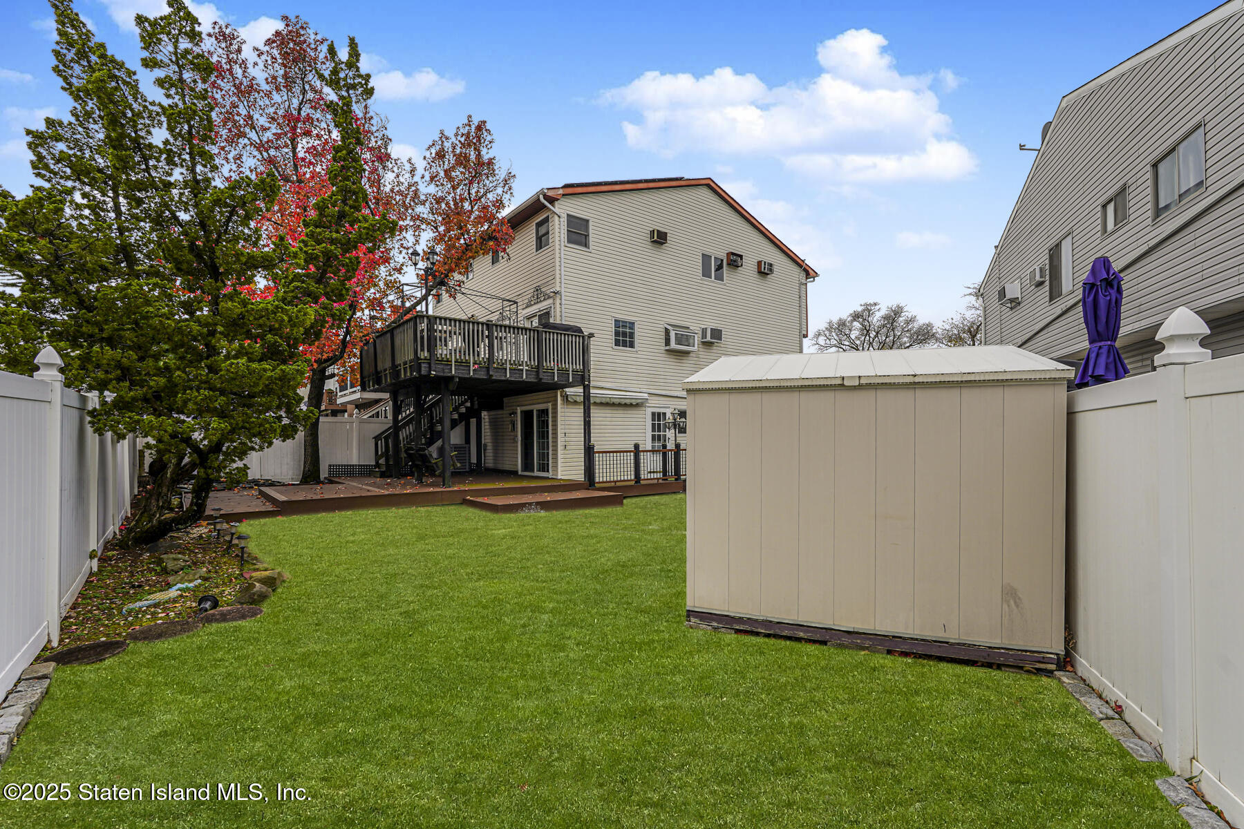 197 Crossfield Avenue Staten Island, NY 10312 - Photo 27 of 28 a view of a house with backyard and garden