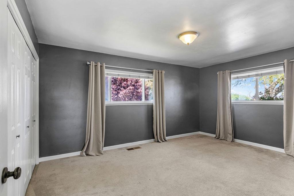 4930 South Faith Home Road Turlock, CA 95380 - Photo 21 of 69 This bedroom could be a Jr. Suite or in-laws' quarters...Or extra room when you need space from your partner/spouse.