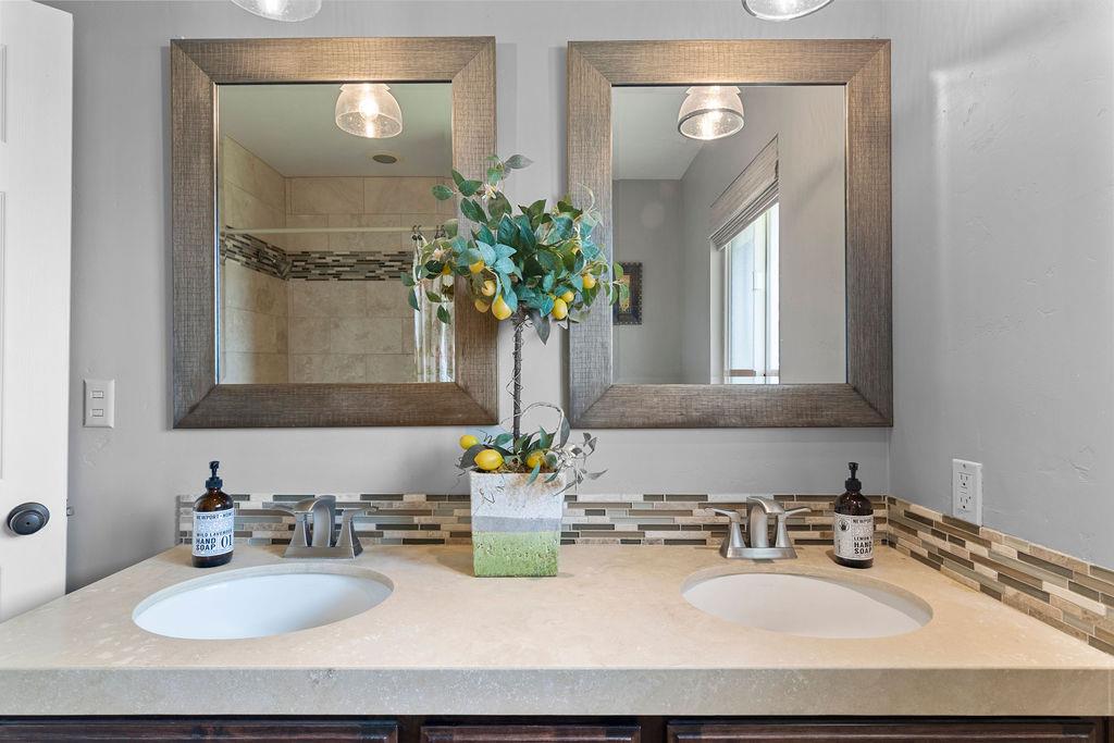 4930 South Faith Home Road Turlock, CA 95380 - Photo 32 of 69 full bath with double vanity and a tile shower