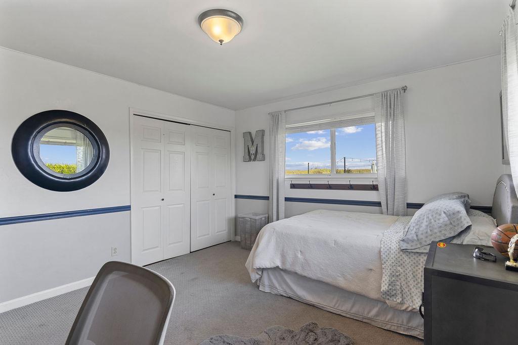 4930 South Faith Home Road Turlock, CA 95380 - Photo 35 of 69 bedroom featuring carpet and a closet