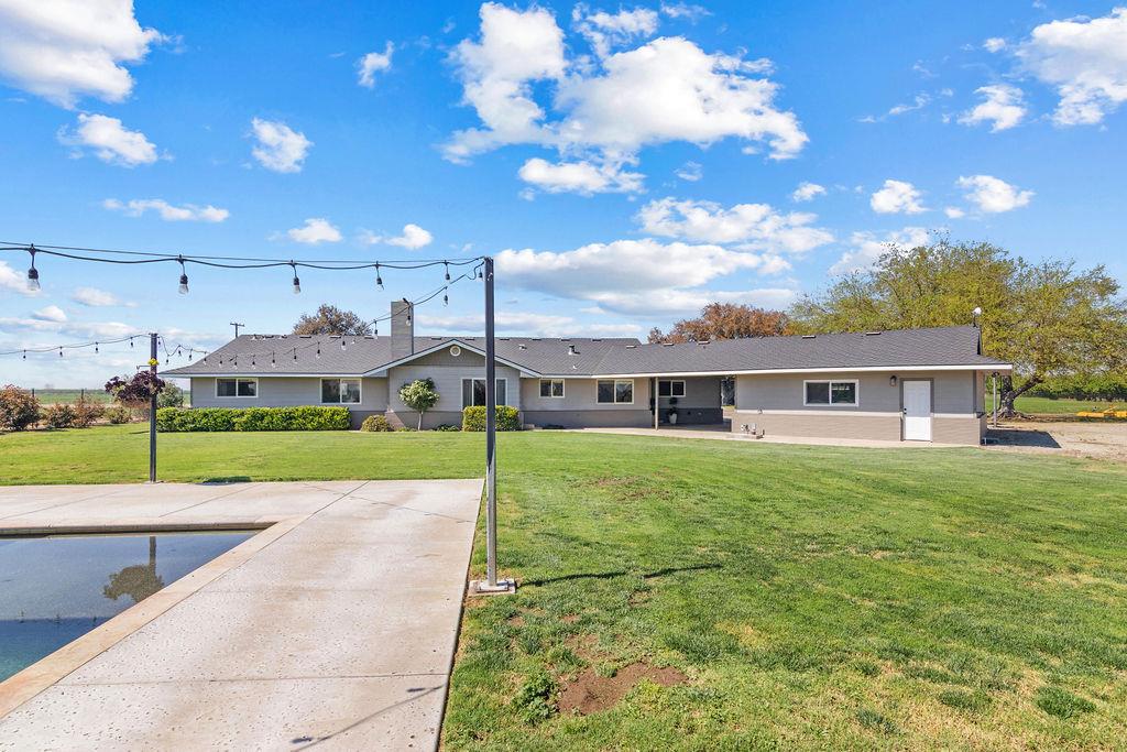 4930 South Faith Home Road Turlock, CA 95380 - Photo 45 of 69 ranch-style house featuring a front yard and a patio area