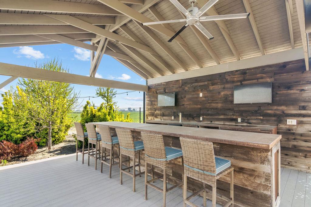 4930 South Faith Home Road Turlock, CA 95380 - Photo 49 of 69 view of patio with ceiling fan and a wooden deck