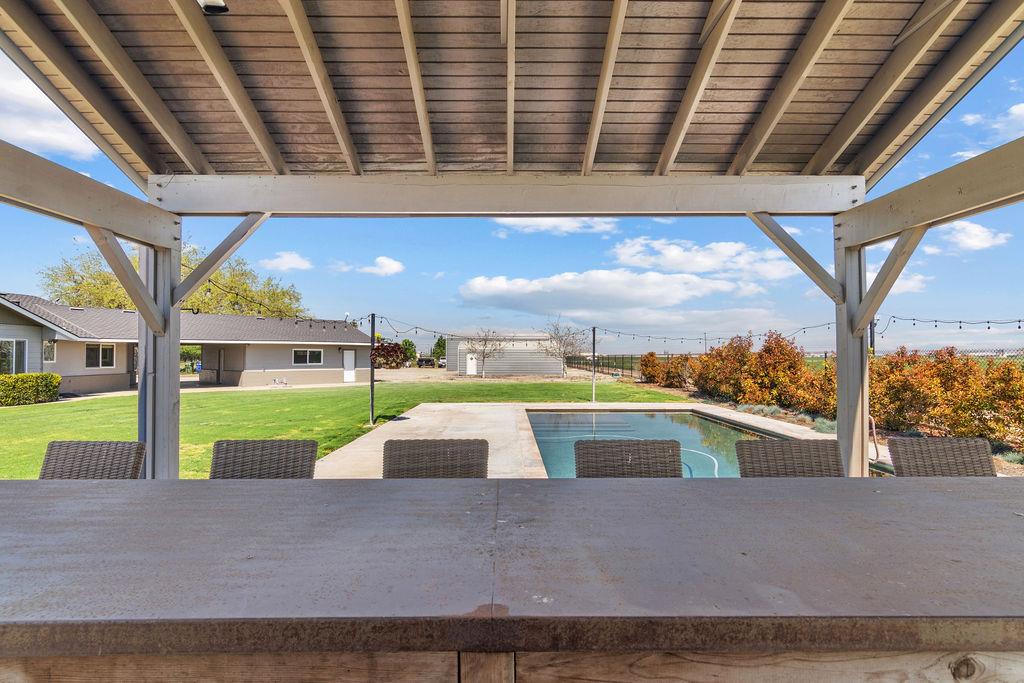 4930 South Faith Home Road Turlock, CA 95380 - Photo 50 of 69 view of patio featuring an outdoor pool