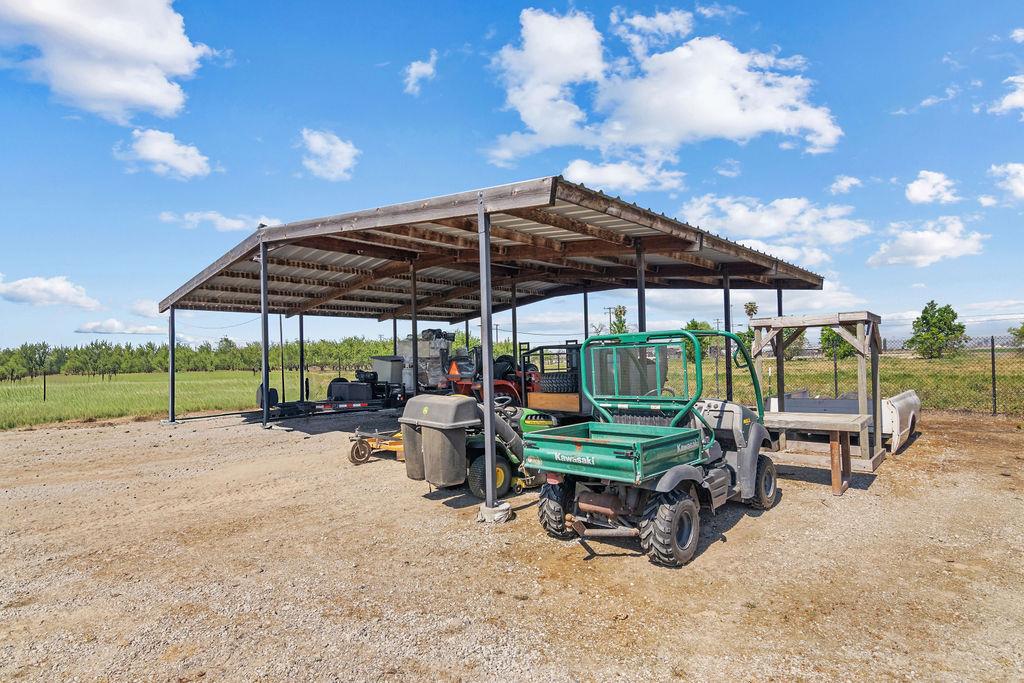 4930 South Faith Home Road Turlock, CA 95380 - Photo 56 of 69 view of parking with a detached carport and a rural view