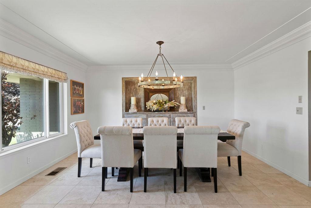 4930 South Faith Home Road Turlock, CA 95380 - Photo 10 of 69 Natural lighting in the beautifully appointed dining room area.