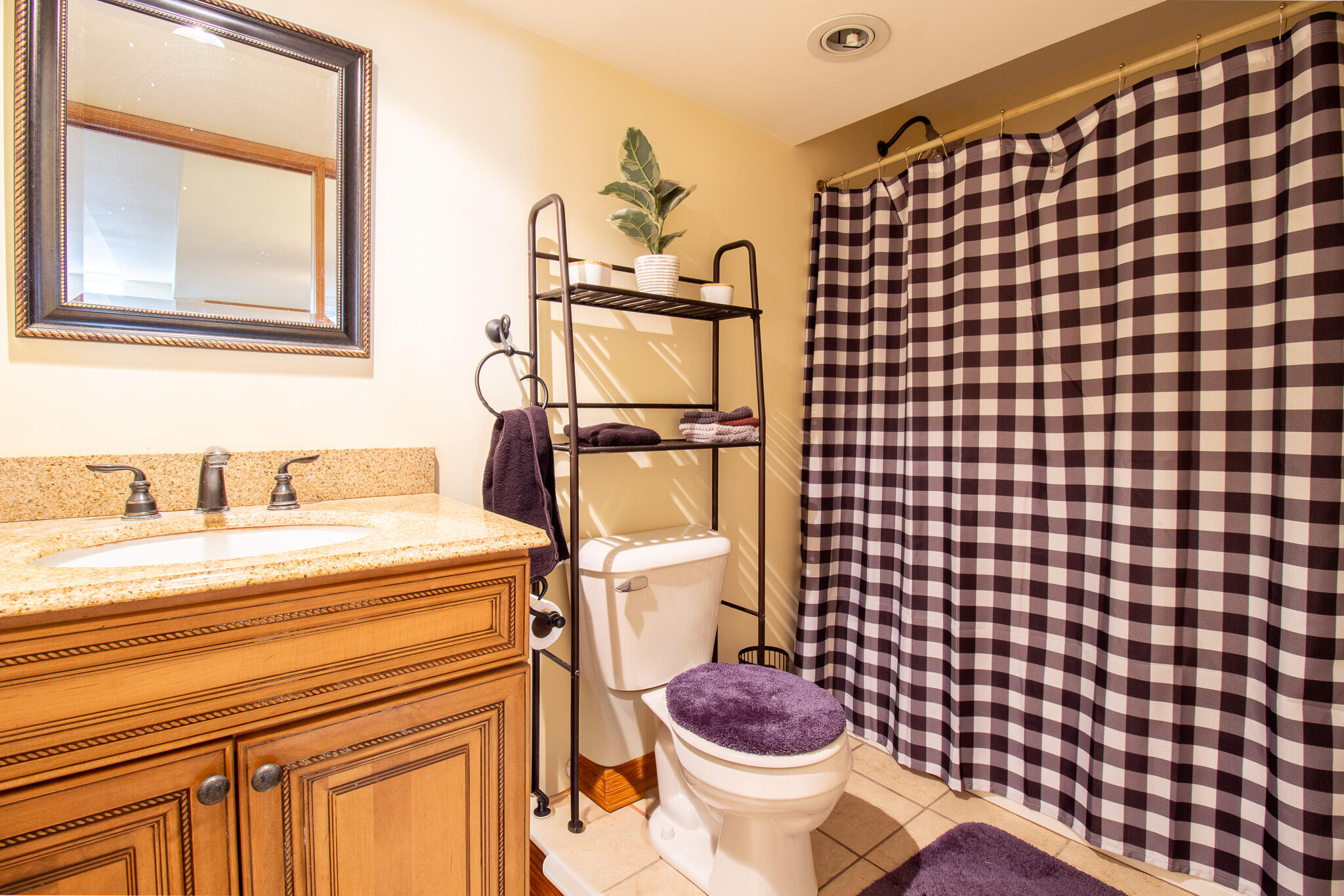 2550 Honelee Court Valparaiso, IN 46385 - Photo 32 of 37 a bathroom with a sink toilet and shower
