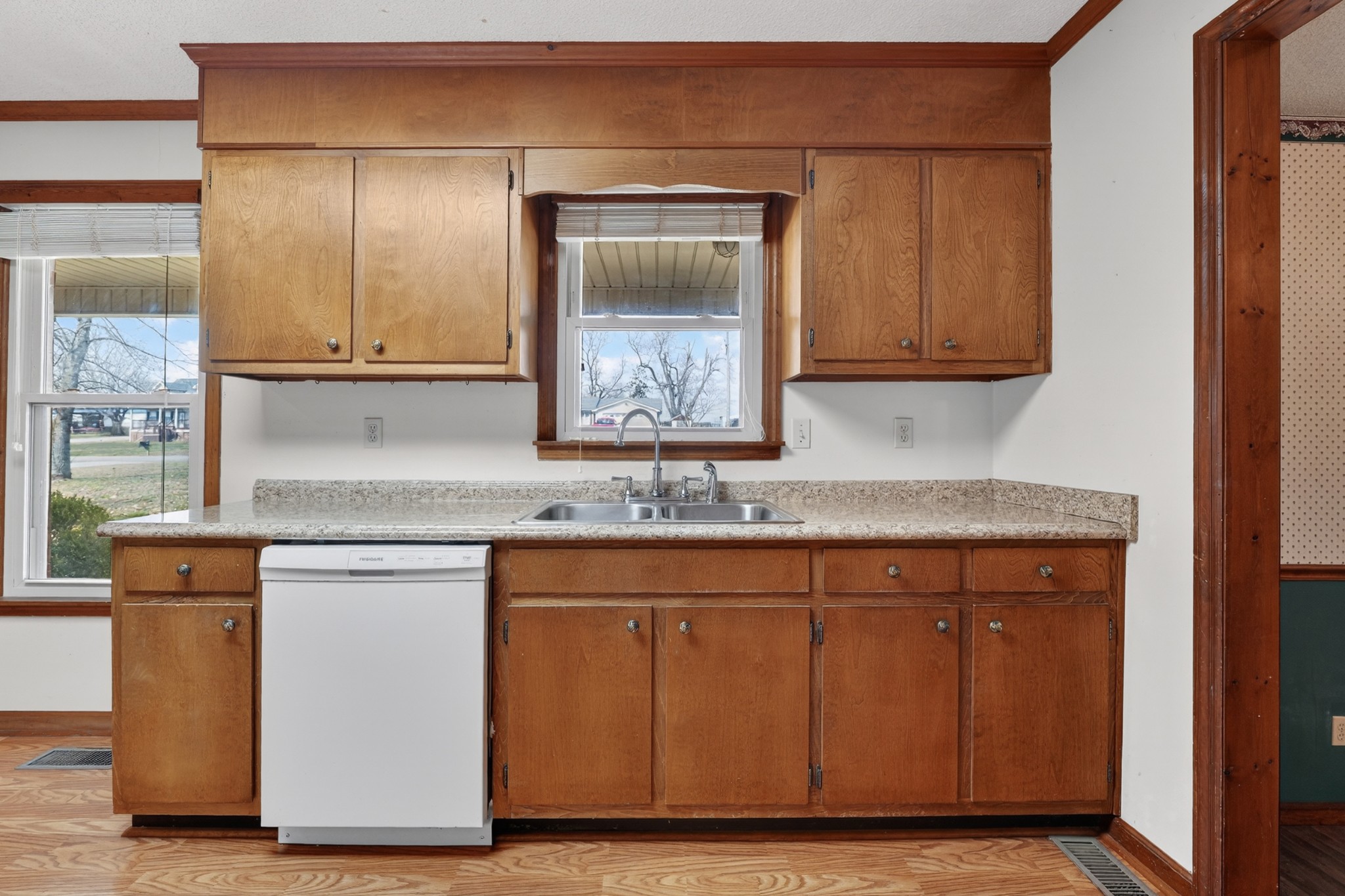 679 Howell Hill Road Flintville, TN 37335 - Photo 12 of 44 a kitchen with granite countertop a sink and cabinets